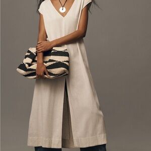 One size fits all, on trend Anthropologie tunic.